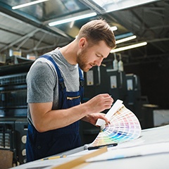 a color consultant looking at paint samples