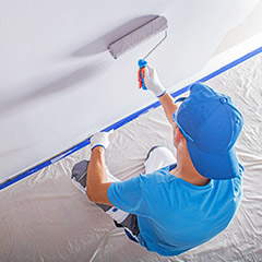 Man painting a wall