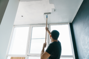 an older home’s interior being painted 