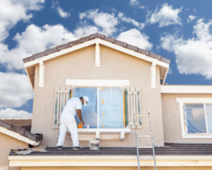 the exterior of a house being painted